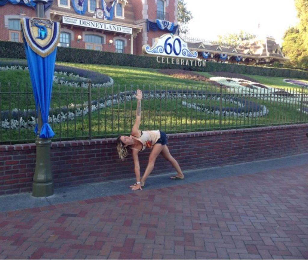 Revolved Triangle Pose at Disney by Frankie Love for TryBelle Magazine