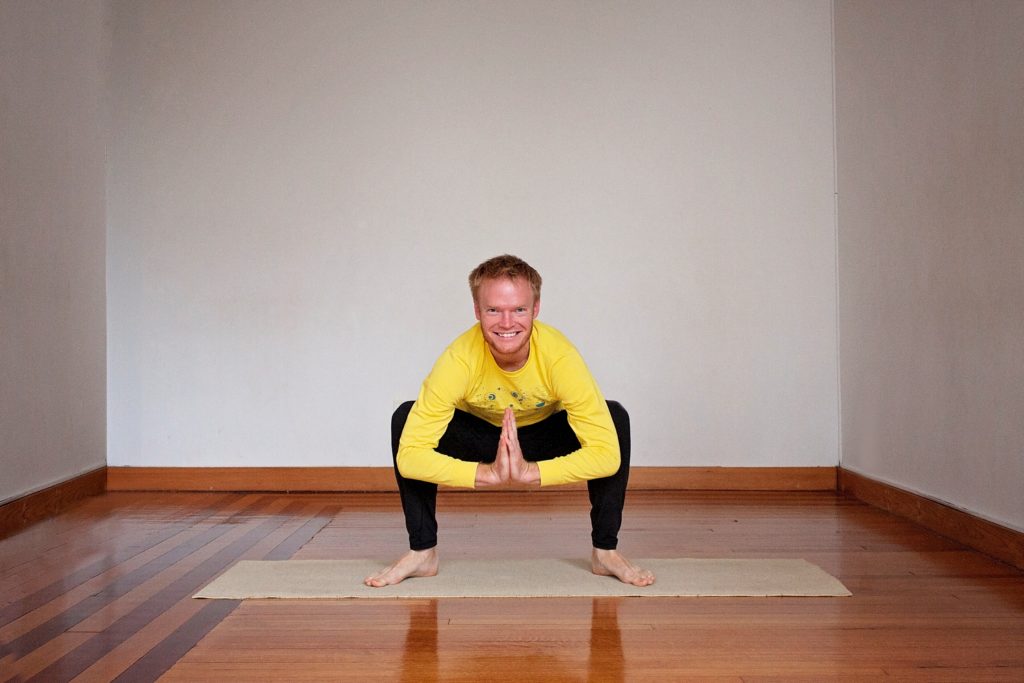 Five Poses to Help Rock Crow Pose - Squat Pose by Paul Giese