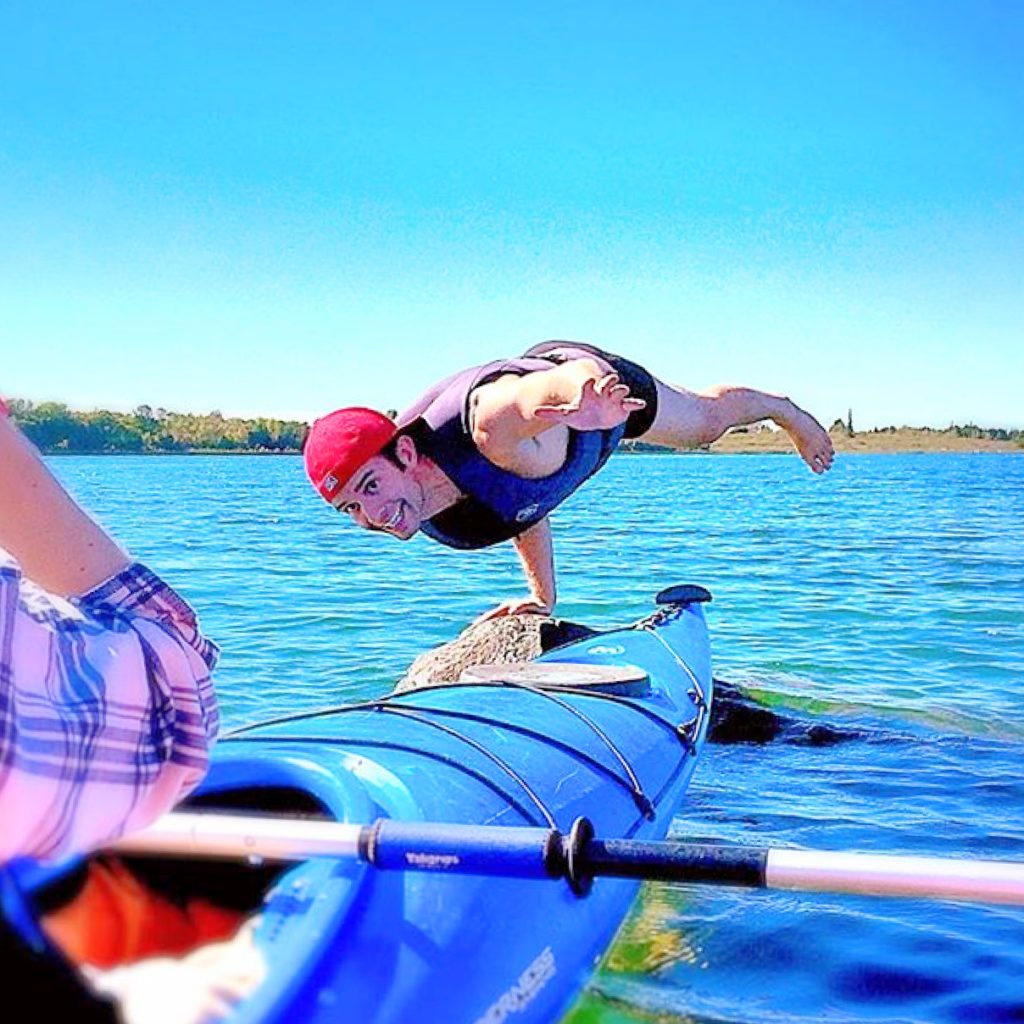 Yoga on a Kayak on Manitoulin Island by Raymond Beaudry